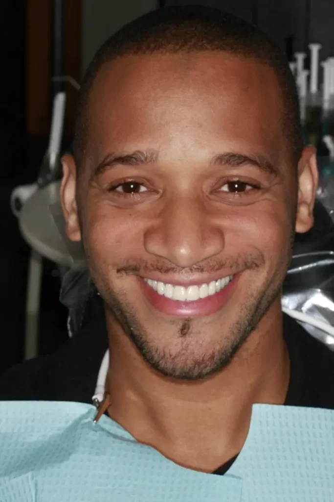 Patient portrait after dental implants at Flax Dental, Atlanta